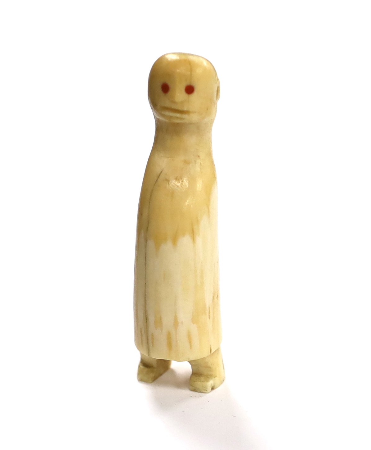 An Inuit (?) figural carved whale tooth, early 20th century, 8cm
